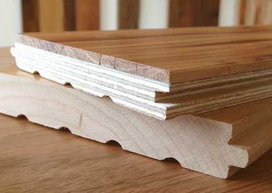 Cross-section comparing solid and engineered timber flooring boards